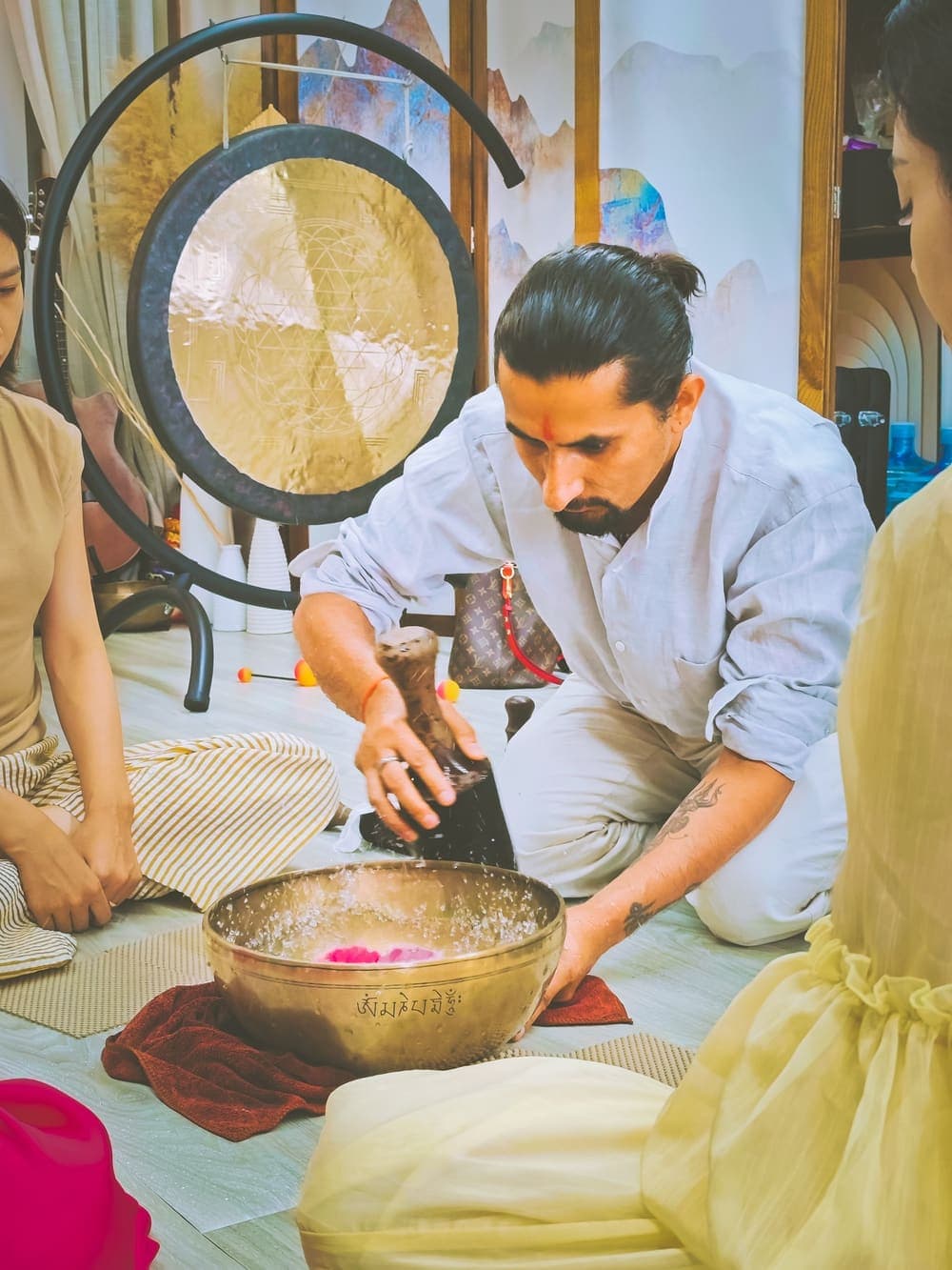 Preparing a singing bowl before a session